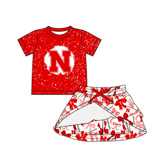 Preorder (moq 5)Baby Girls Peach Short Sleeves Nebraska Top Bows Plaid Skorts Team Set 6.16